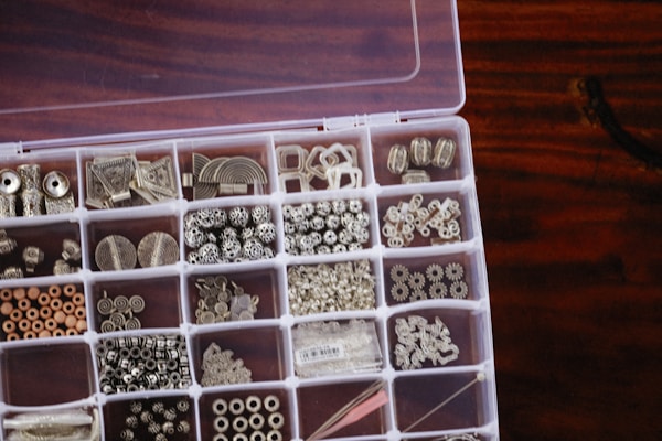 a box filled with lots of different types of buttons