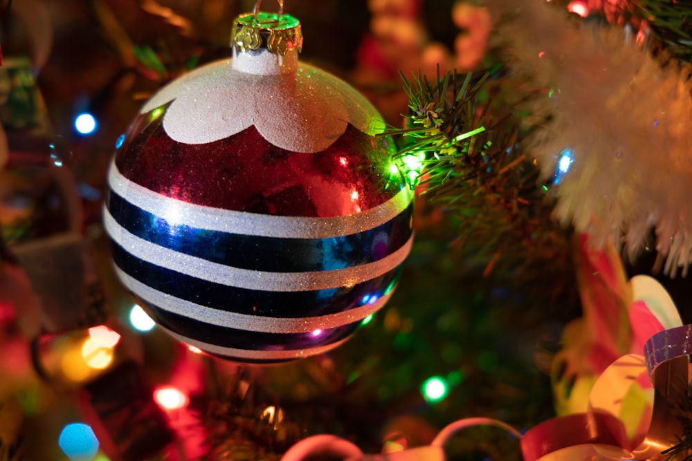 a close up of a christmas ornament on a tree