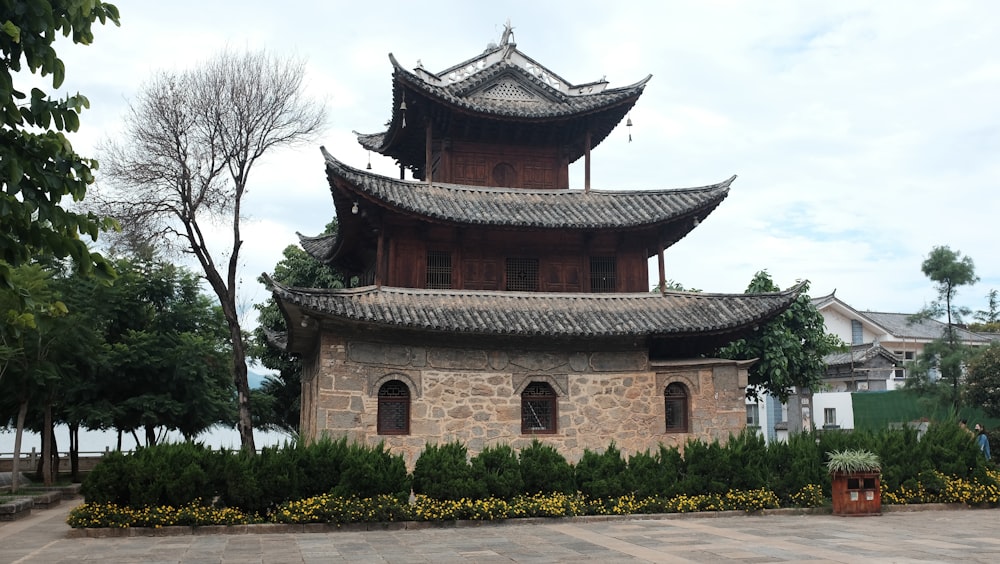 a tall tower with a clock on the top of it