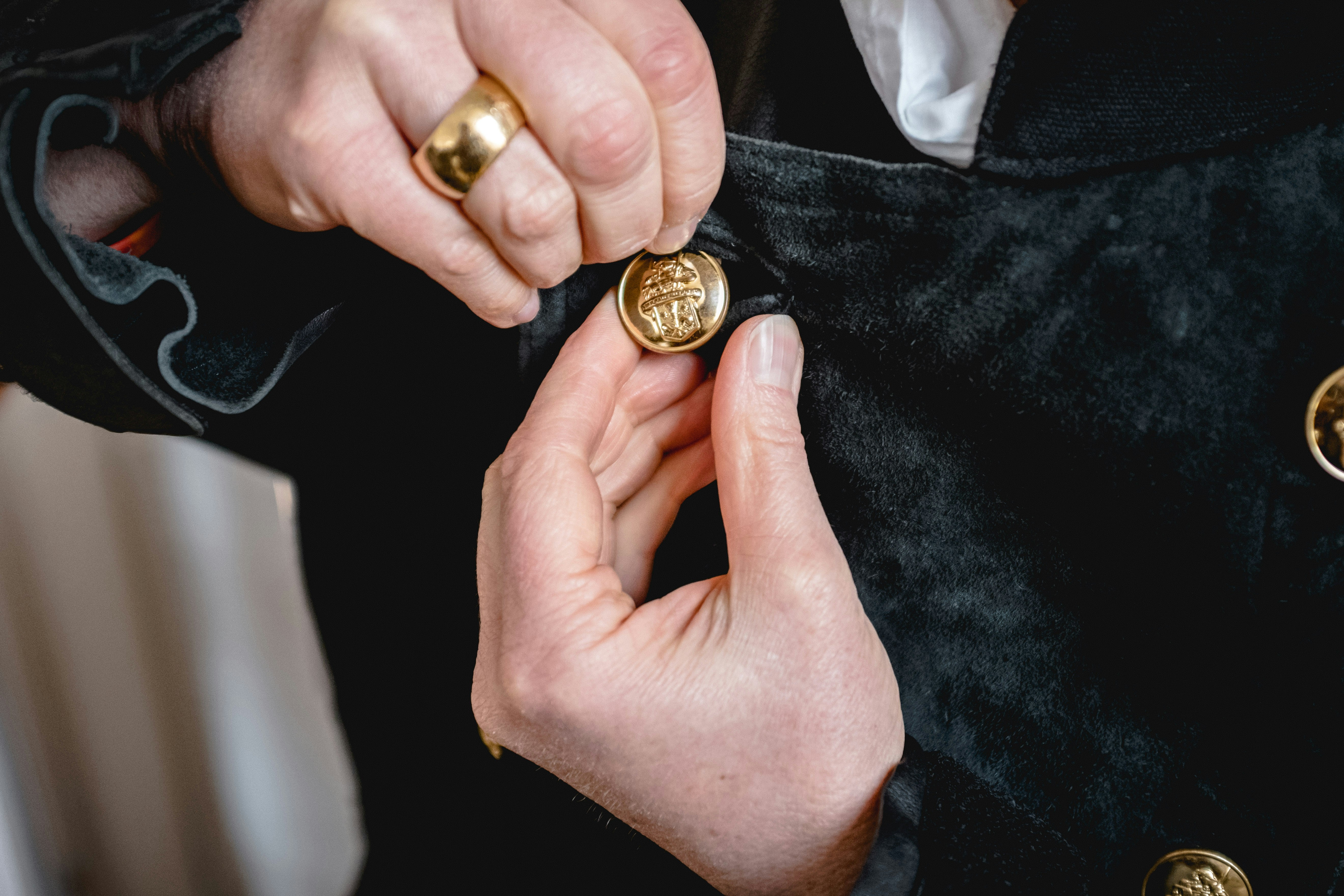 a person holding a ring in their hand