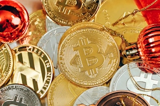 a pile of bitcoins and christmas ornaments