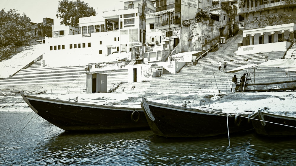 a couple of boats that are sitting in the water