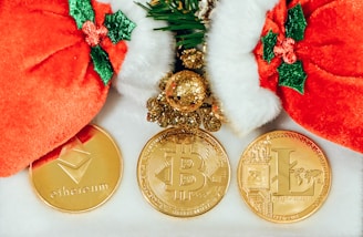 a bunch of gold coins sitting on top of a white table