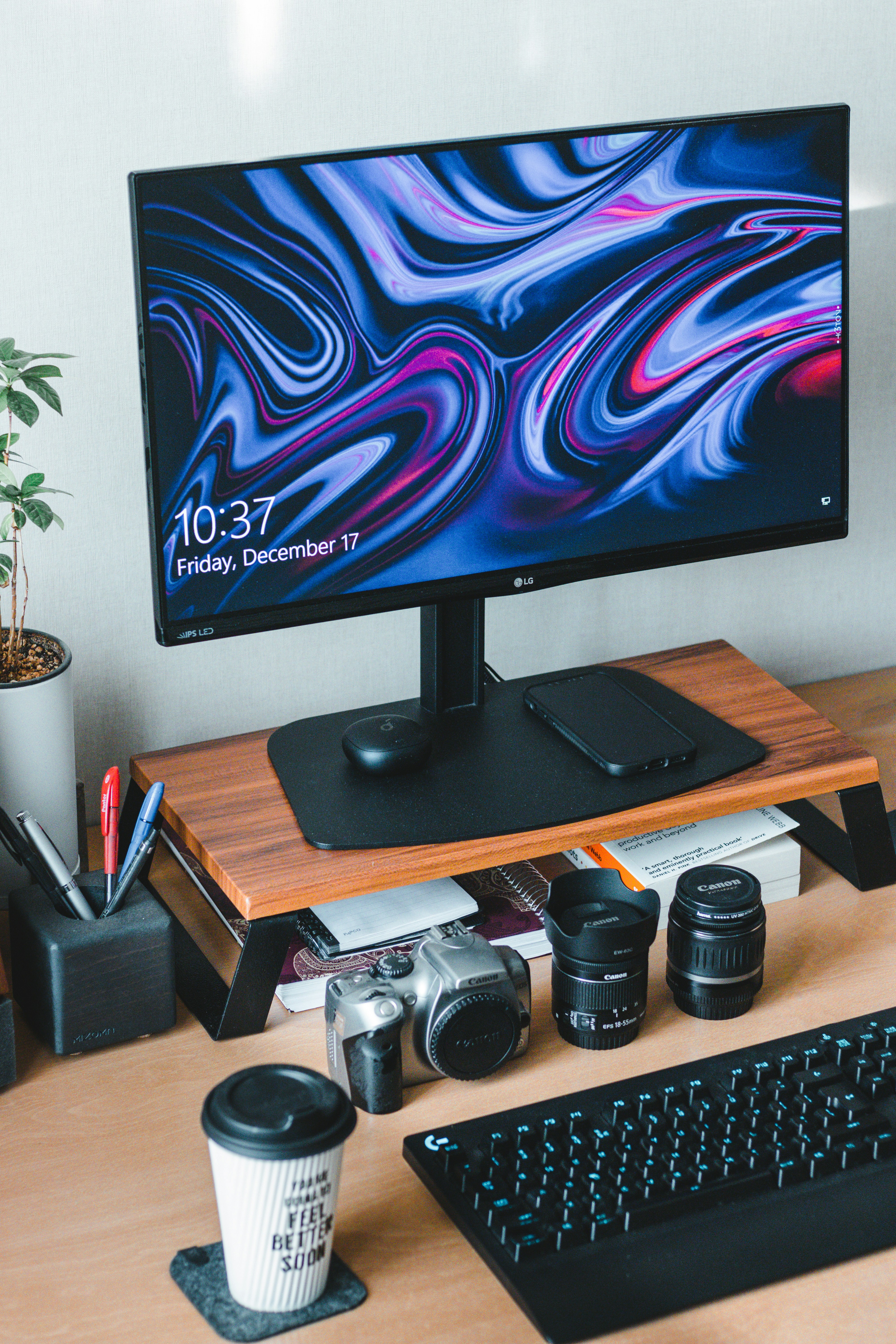 a desktop computer sitting on top of a wooden desk