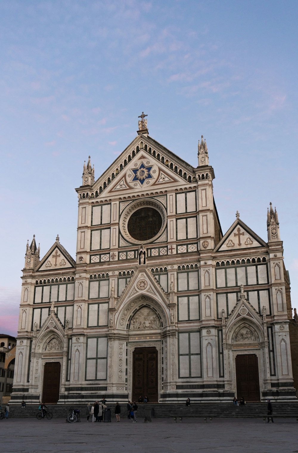 a large building with a clock on the front of it