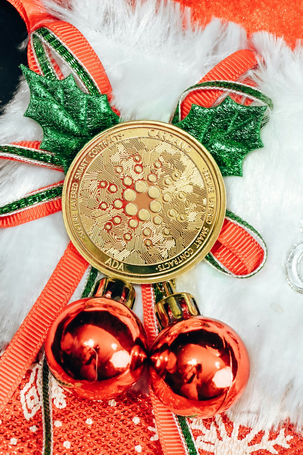 a close up of a christmas decoration with bells