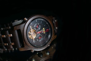 a close up of a watch on a table