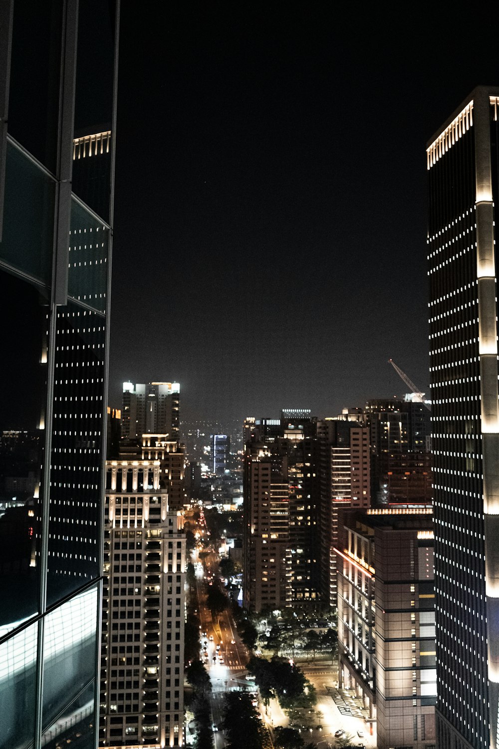 a view of a city at night from a high rise