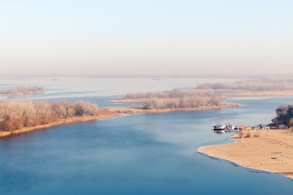 a large body of water surrounded by trees