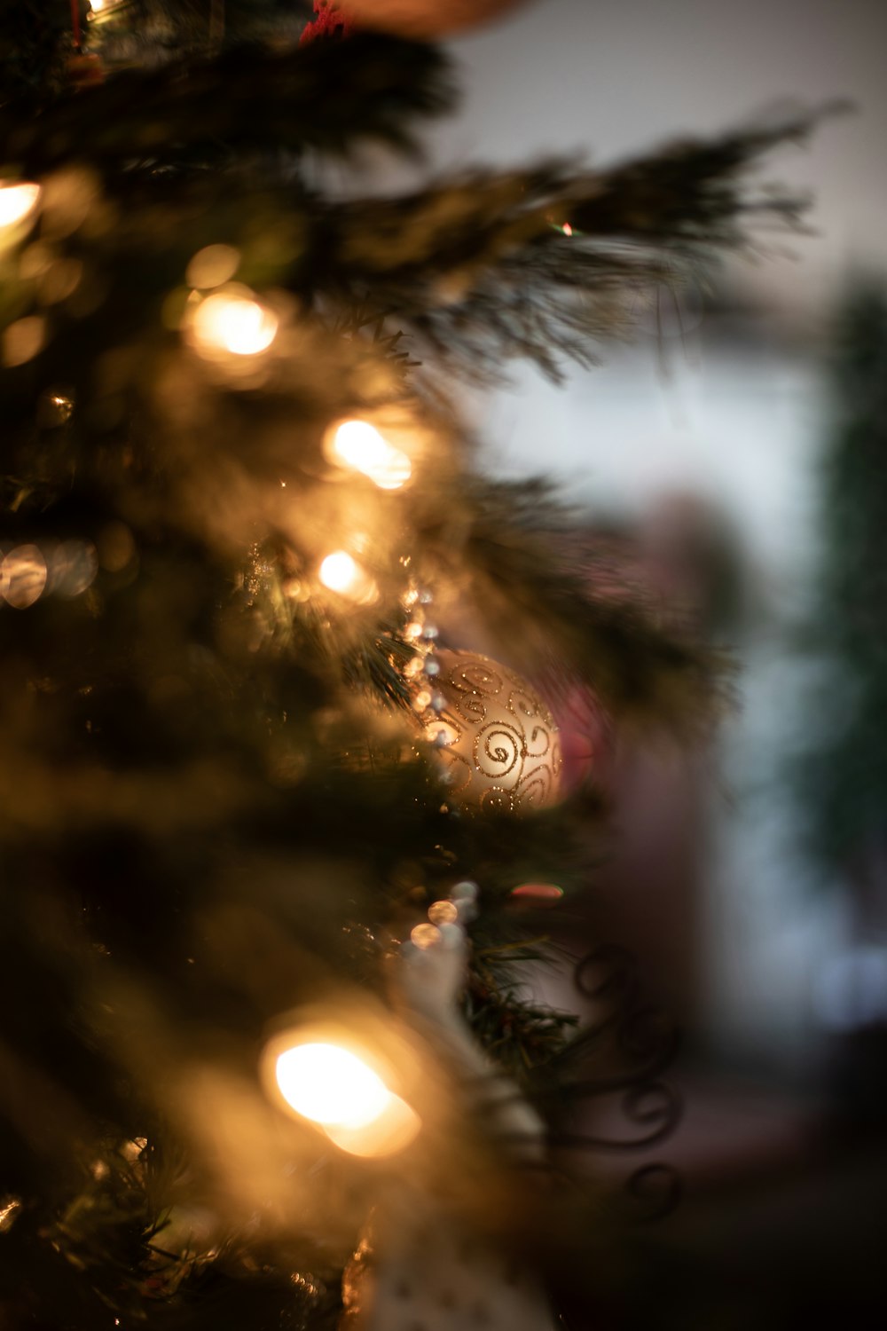 a close up of a christmas tree with lights