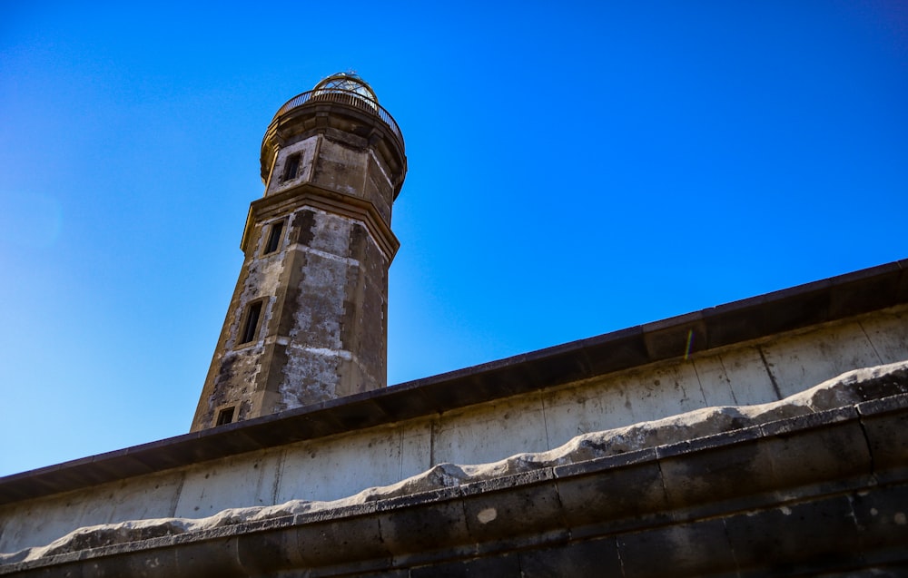 a tall tower with a clock on top of it