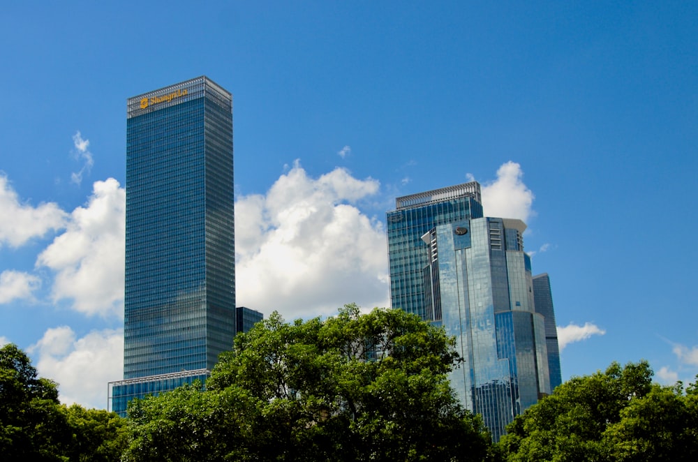 a group of tall buildings sitting next to each other