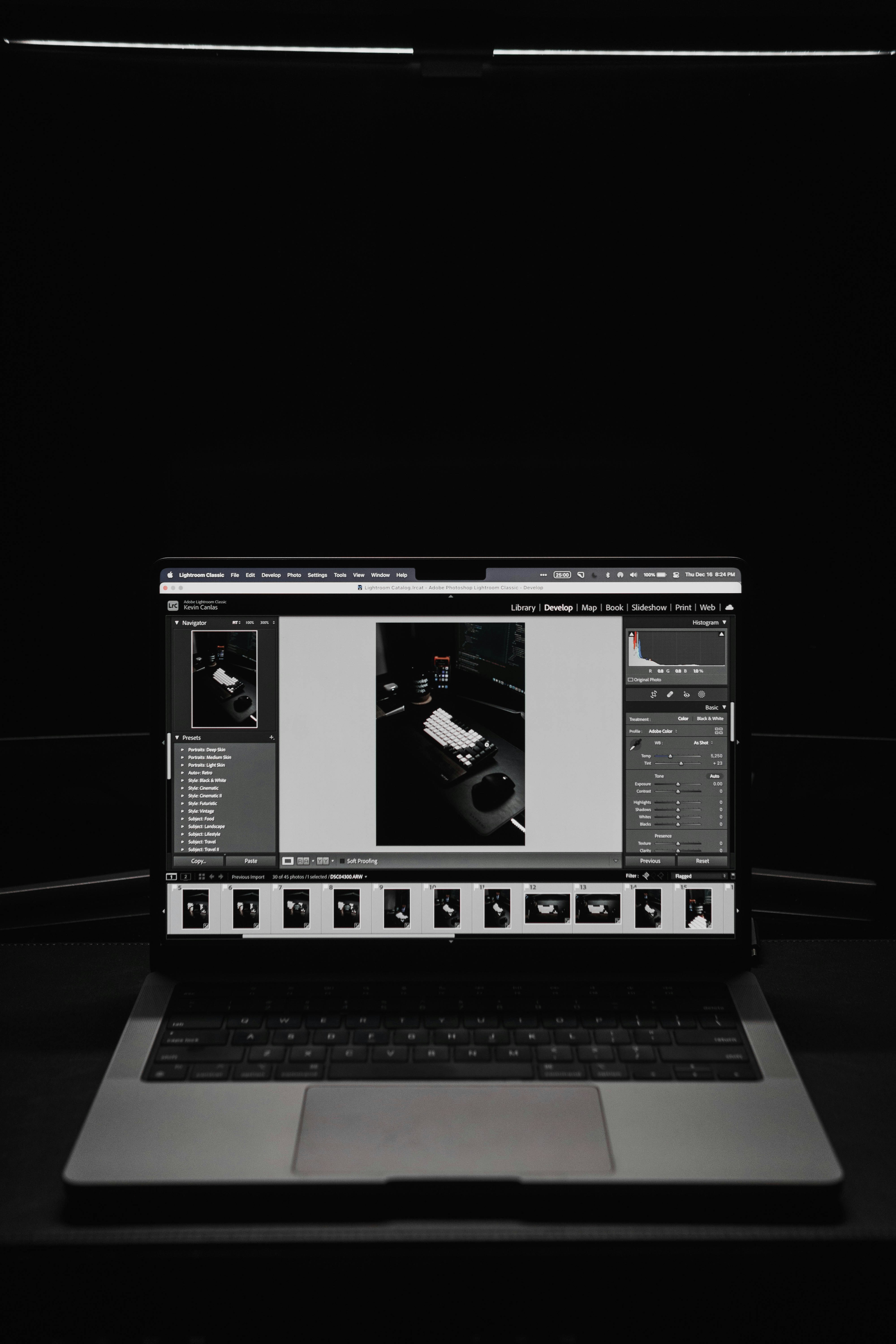 a laptop computer sitting on top of a table