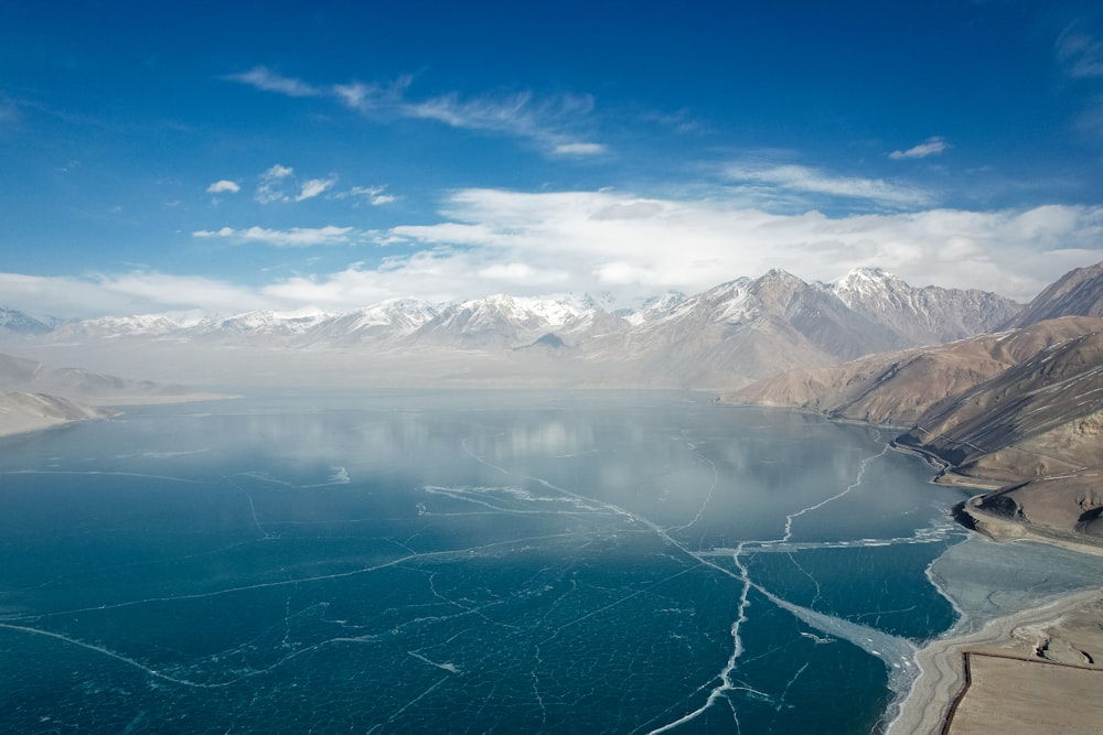 a large body of water surrounded by mountains