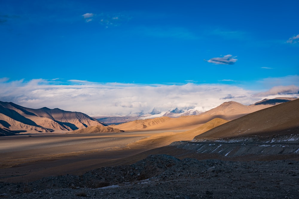 a view of a mountain range in the desert