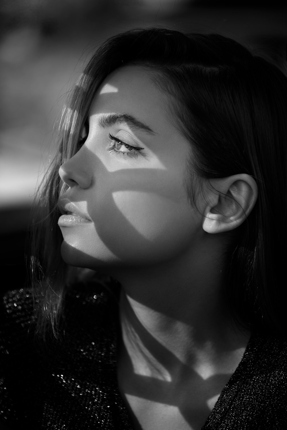 a black and white photo of a woman's face