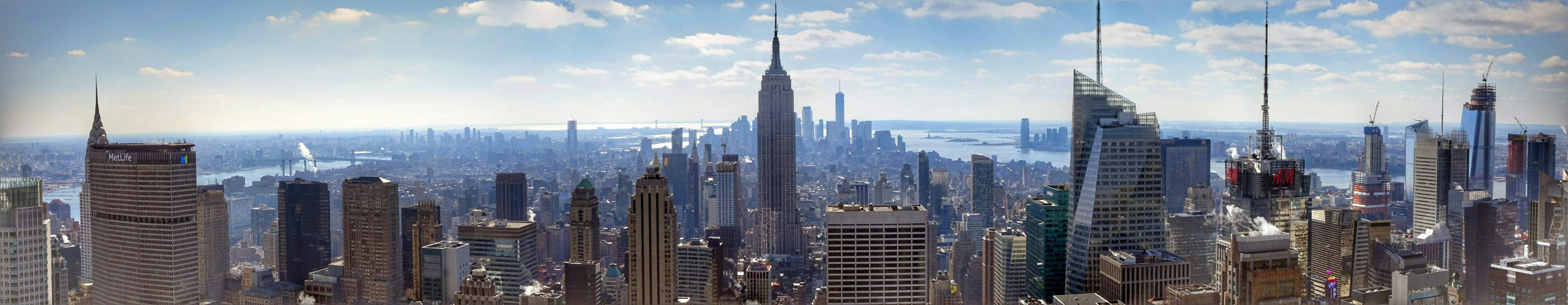 a view of a large city with tall buildings