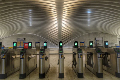Modern turnstile and barrier system integrated with security technology.