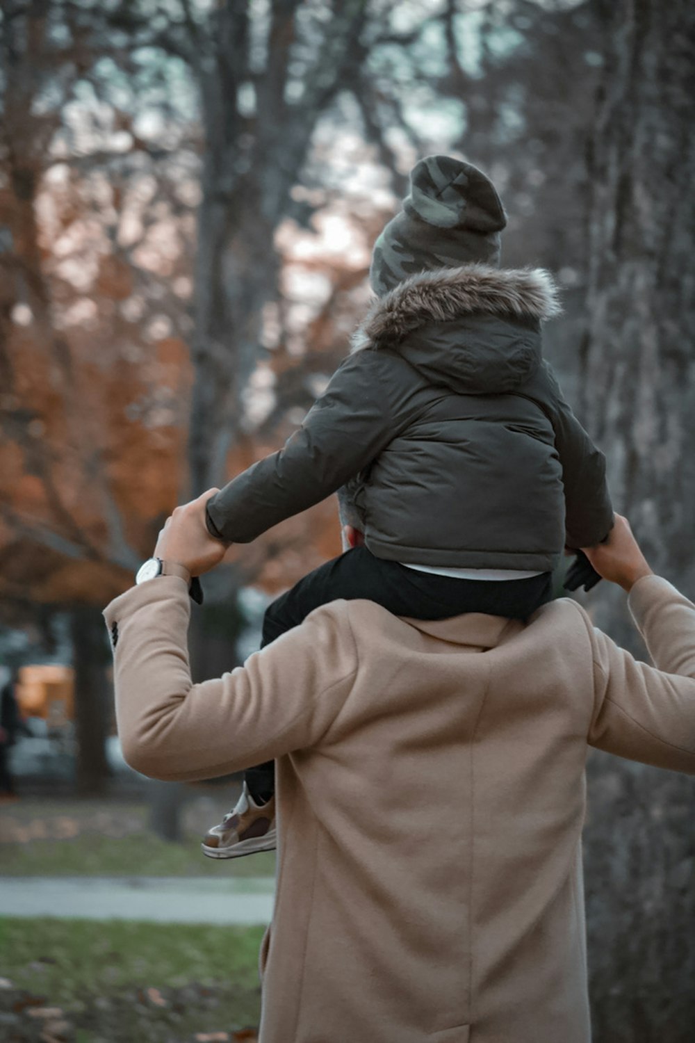 a woman holding a child in her arms