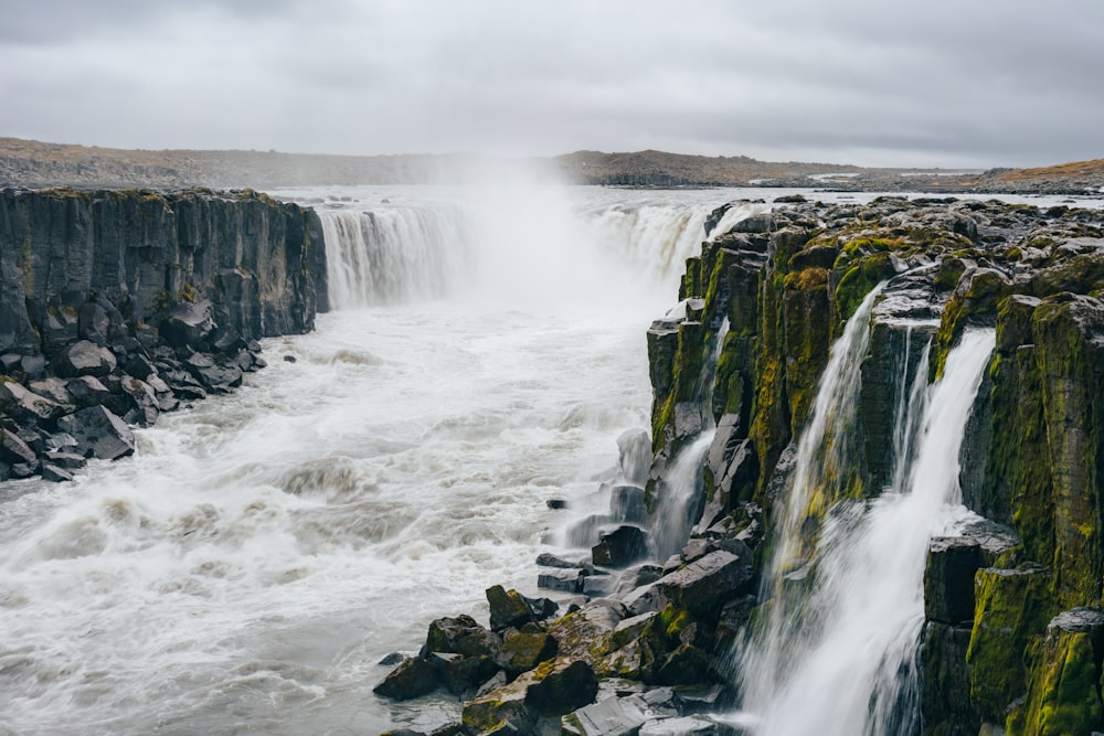 a waterfall with a large amount of water coming out of it