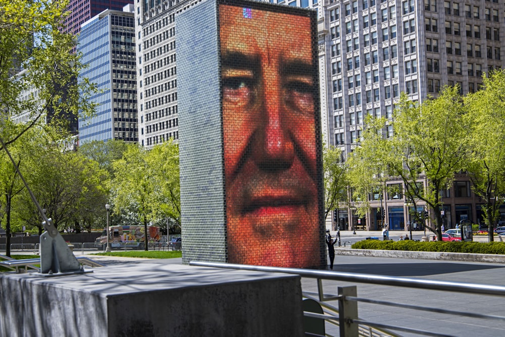 a large picture of a man on the side of a building