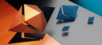 a group of blue and orange shapes on a white surface