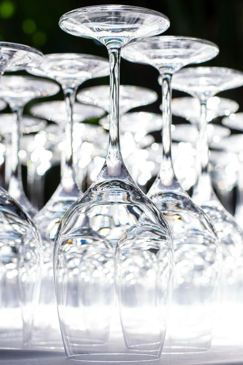 a group of wine glasses sitting on top of a table