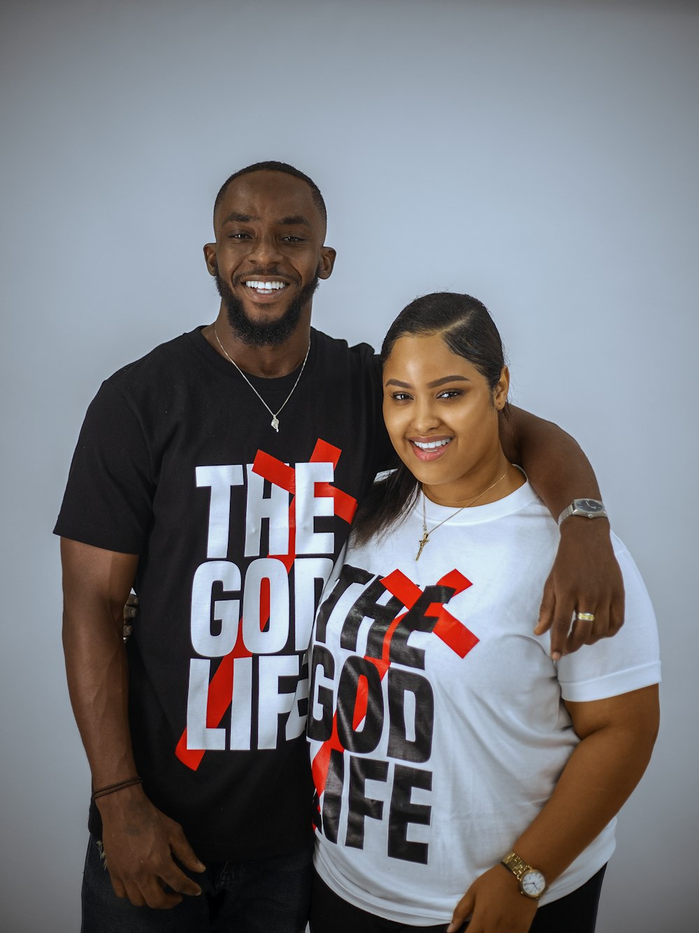 a man and a woman posing for a picture