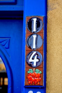 a blue door with a number four painted on it