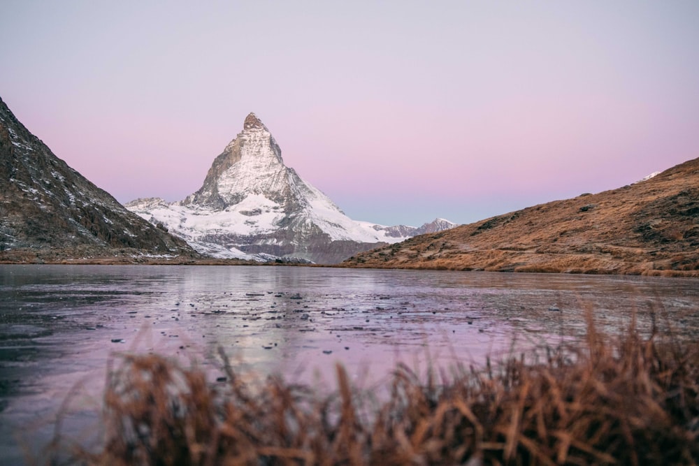 a mountain with a lake in front of it