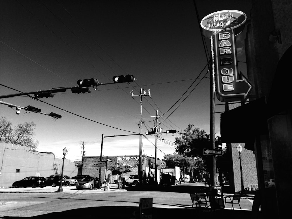 a black and white photo of an intersection