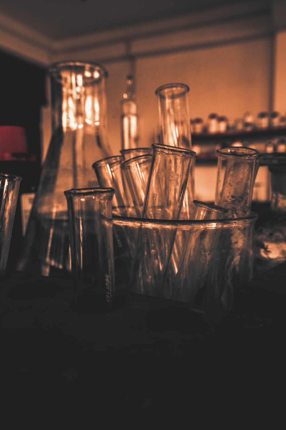 a bunch of glasses sitting on top of a table