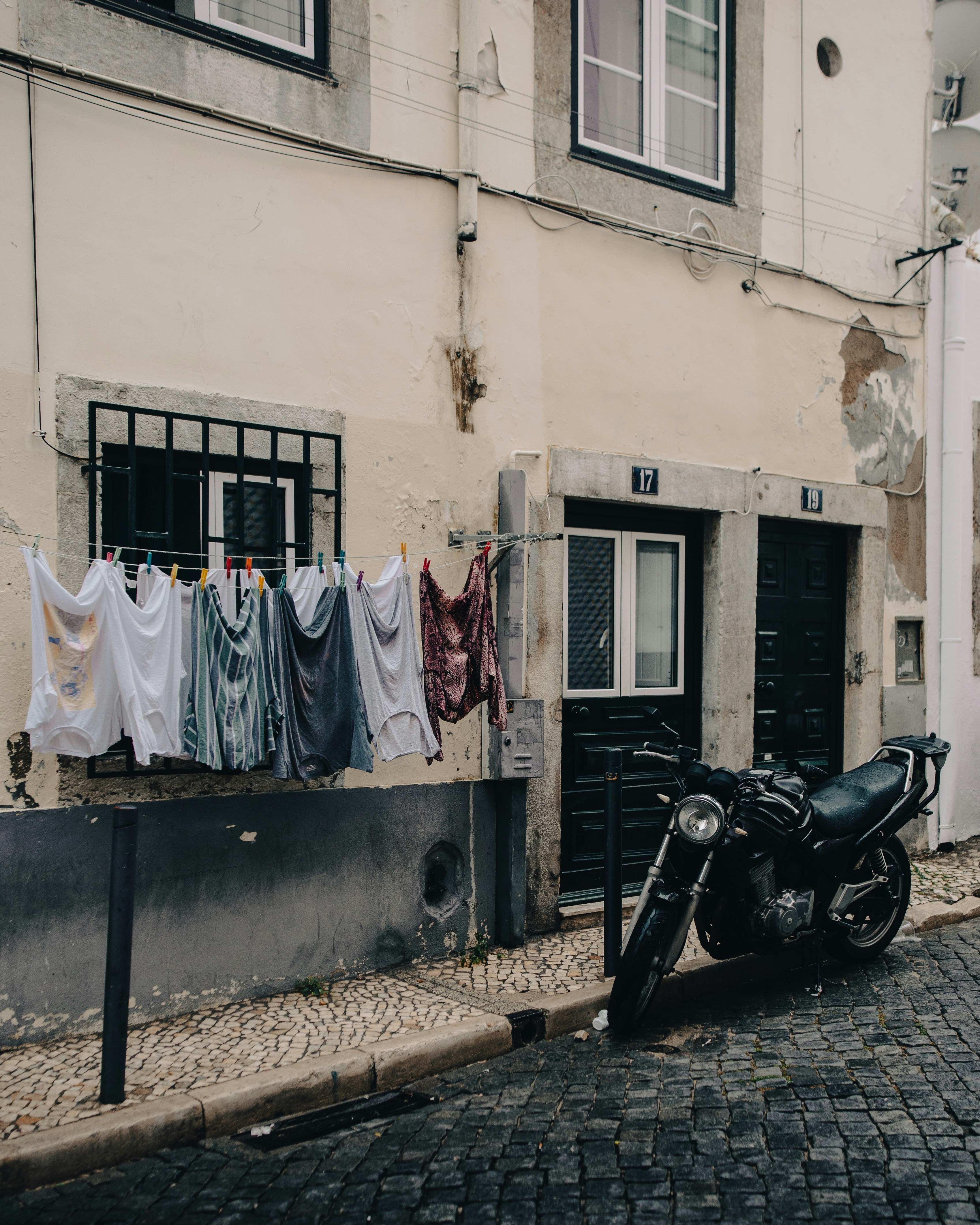 a motorcycle parked in front of a building