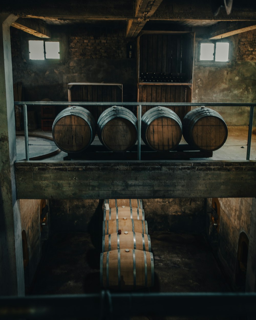 a bunch of barrels that are sitting in a room