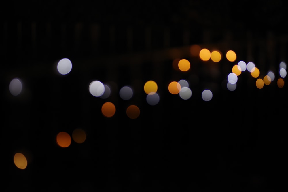 a blurry photo of a city street at night