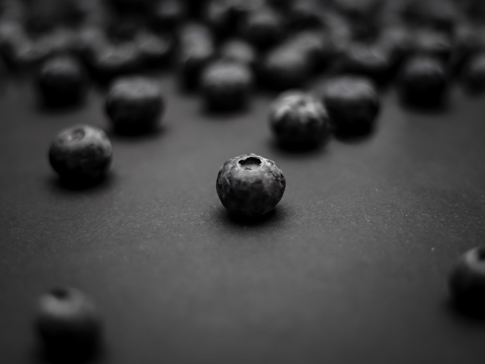 a group of blueberries sitting on top of a table