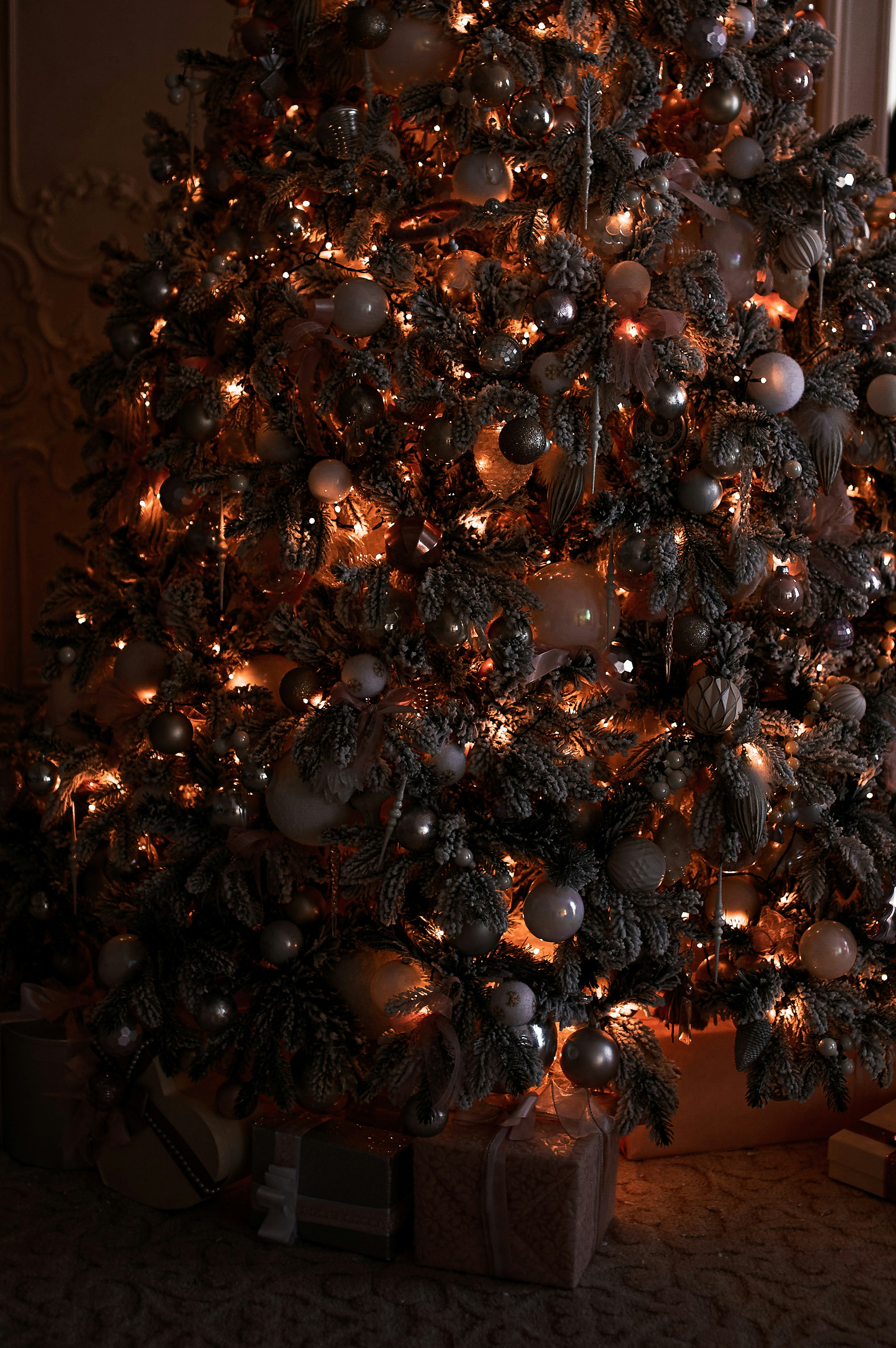 a decorated christmas tree in a living room