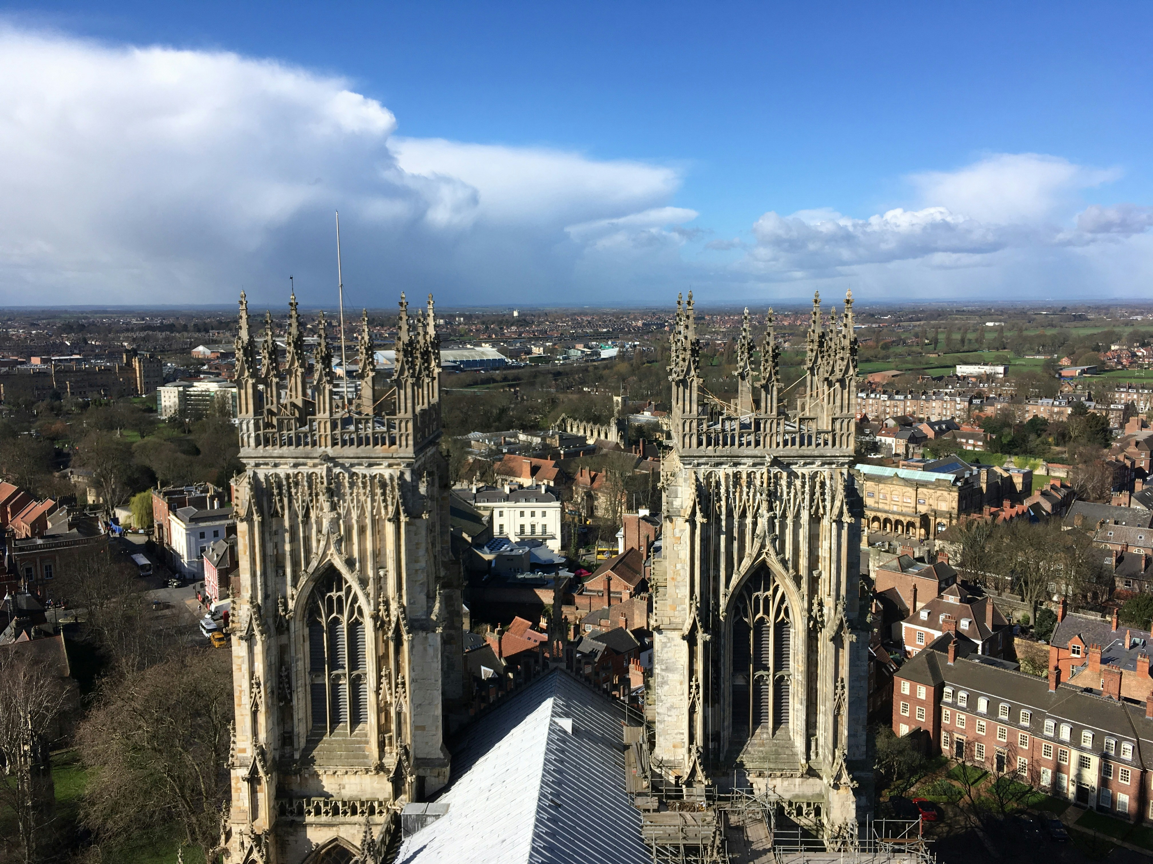 an aerial view of a cathedral in a city