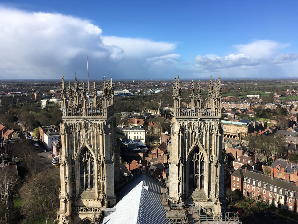 an aerial view of a cathedral in a city