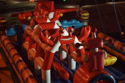 a bunch of inflatable toys that are on a table