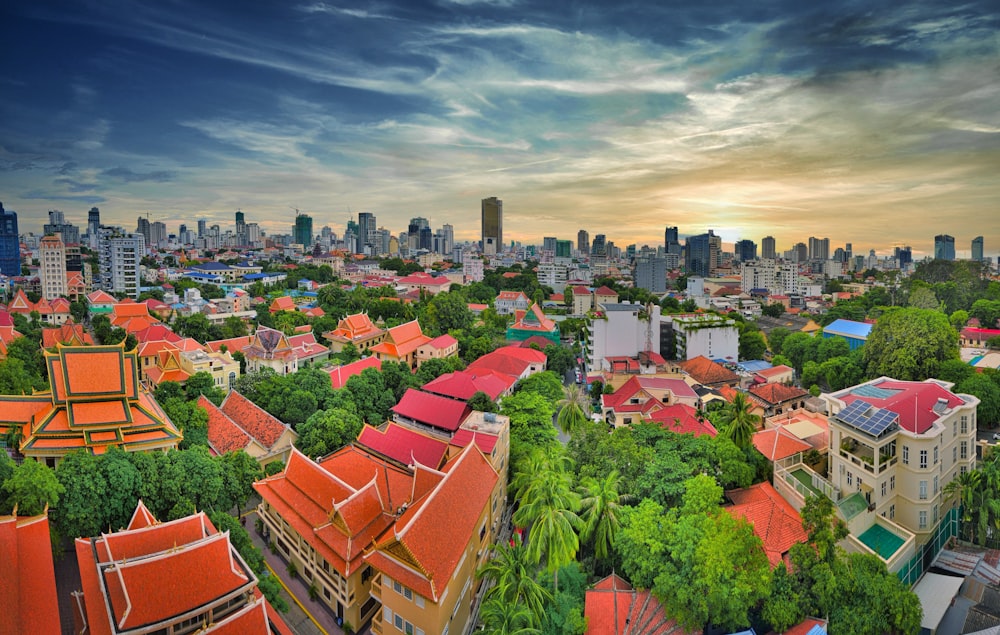 an aerial view of a city with tall buildings