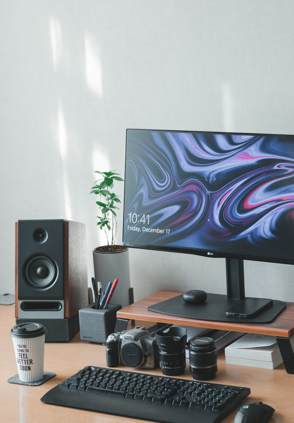 a desktop computer sitting on top of a wooden desk