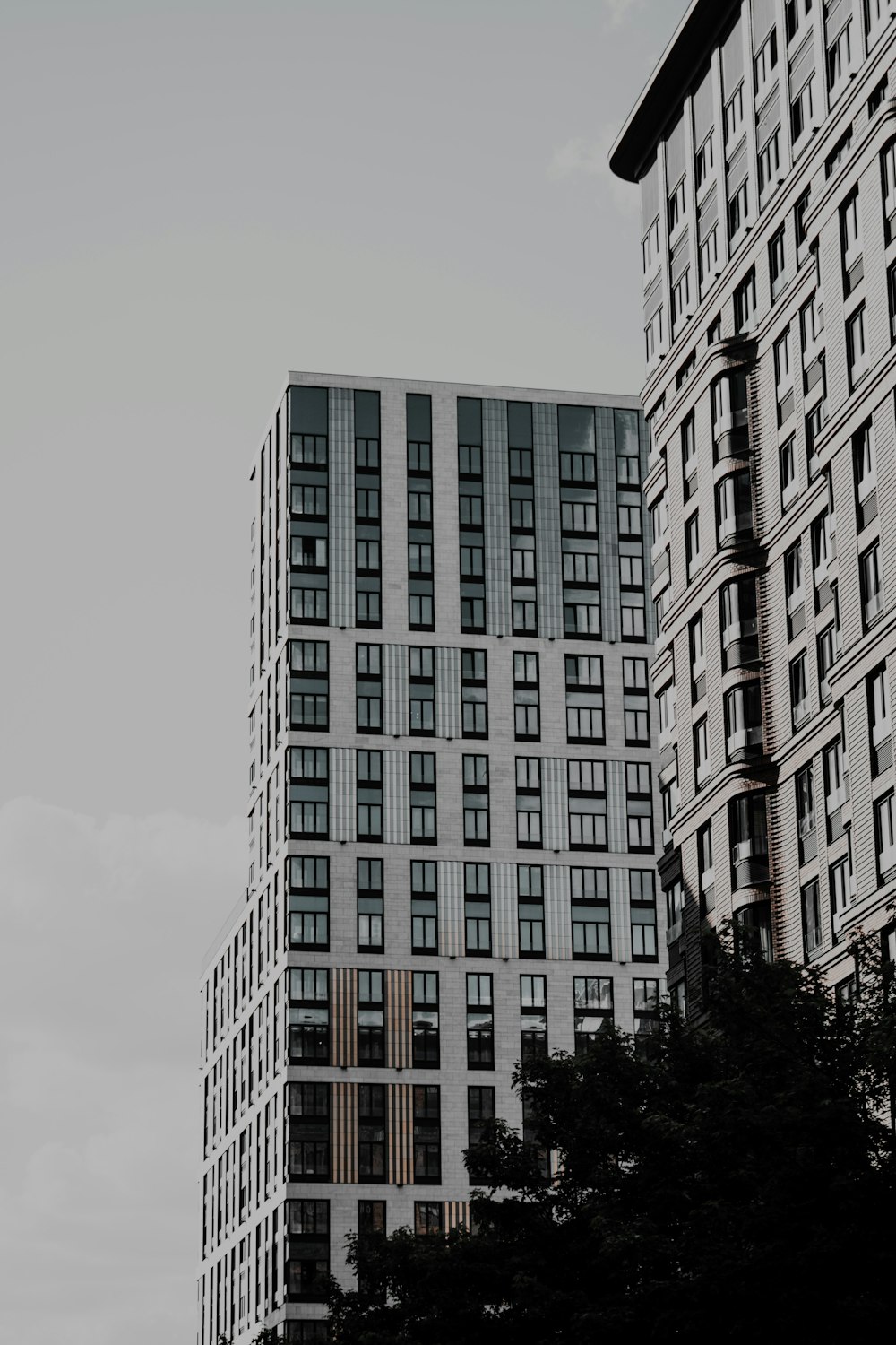 a black and white photo of a tall building