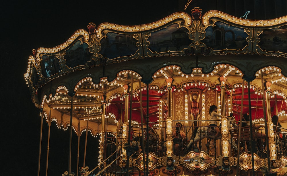 a merry go round at night with lights