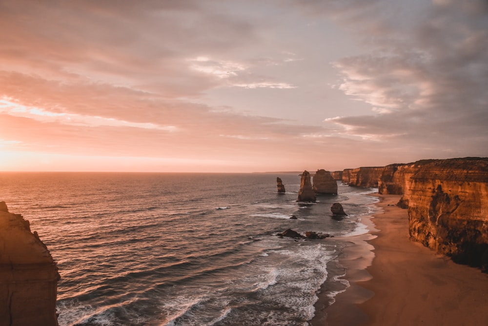 a sunset over a body of water