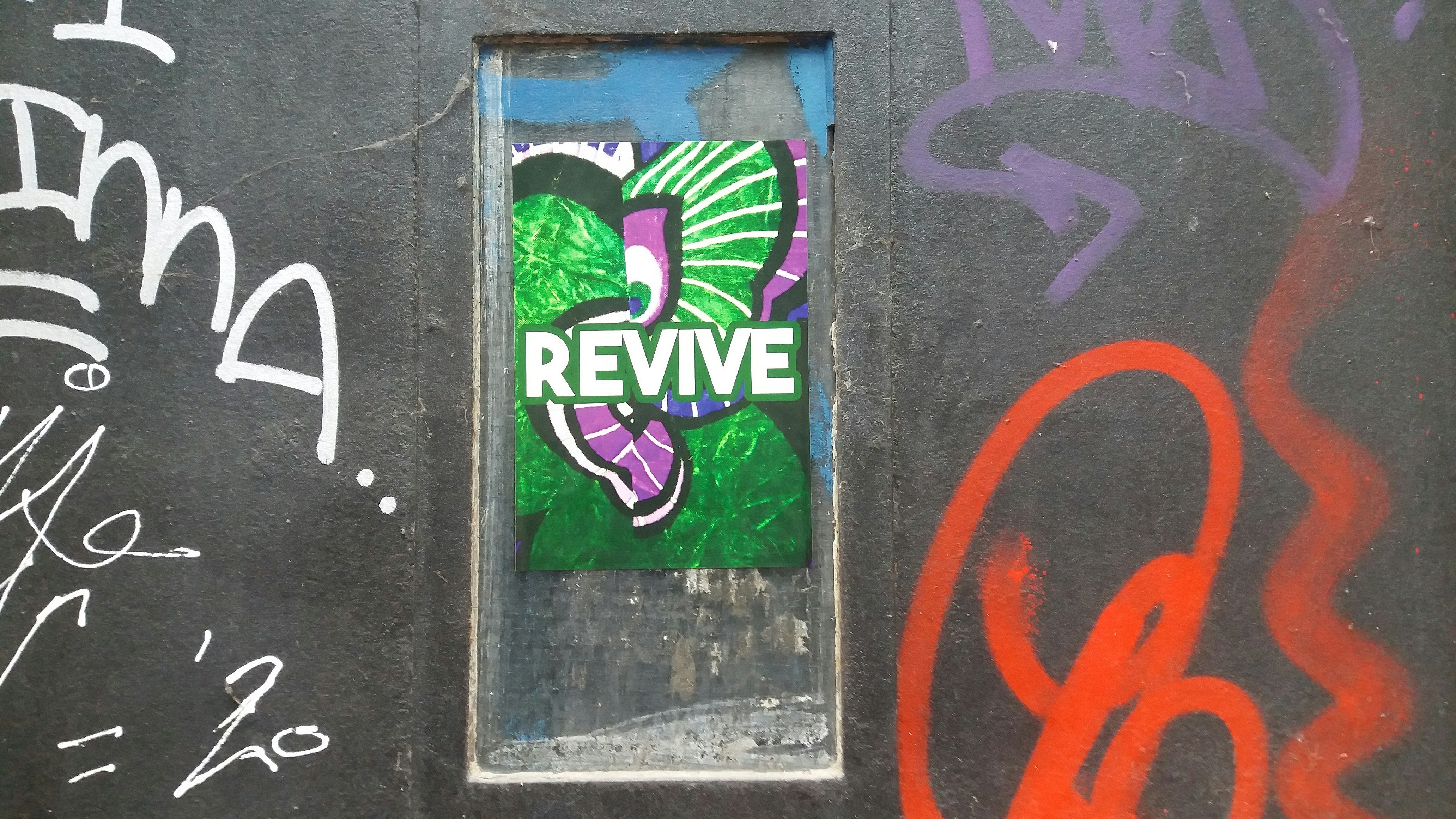 a picture of a door with graffiti on it