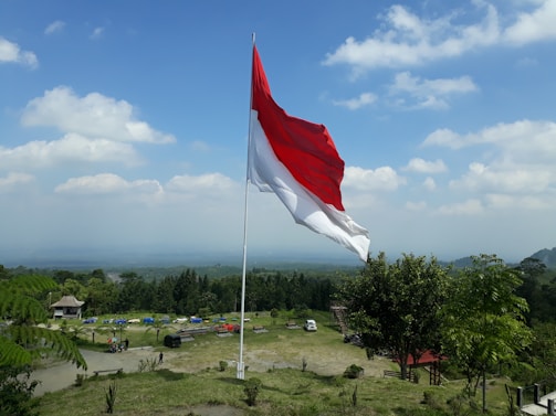 A scenic view of the Inland Empire hills with a British flag planted proudly in the foreground.