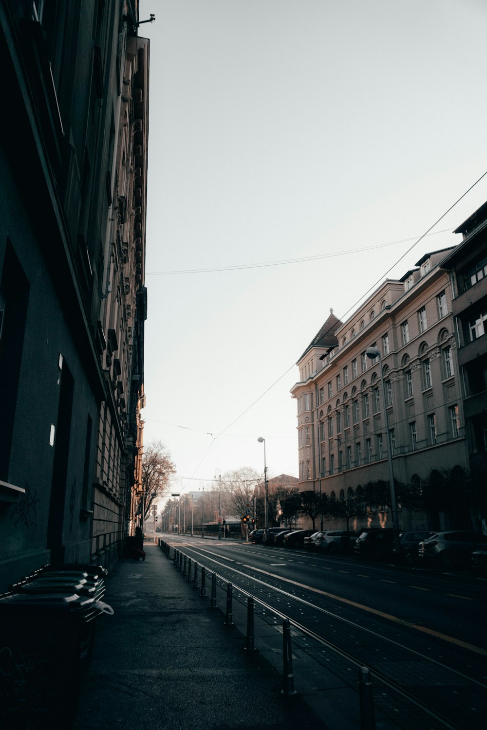 a city street lined with tall buildings