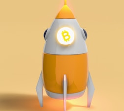 a yellow and white rocket with a dollar sign on it