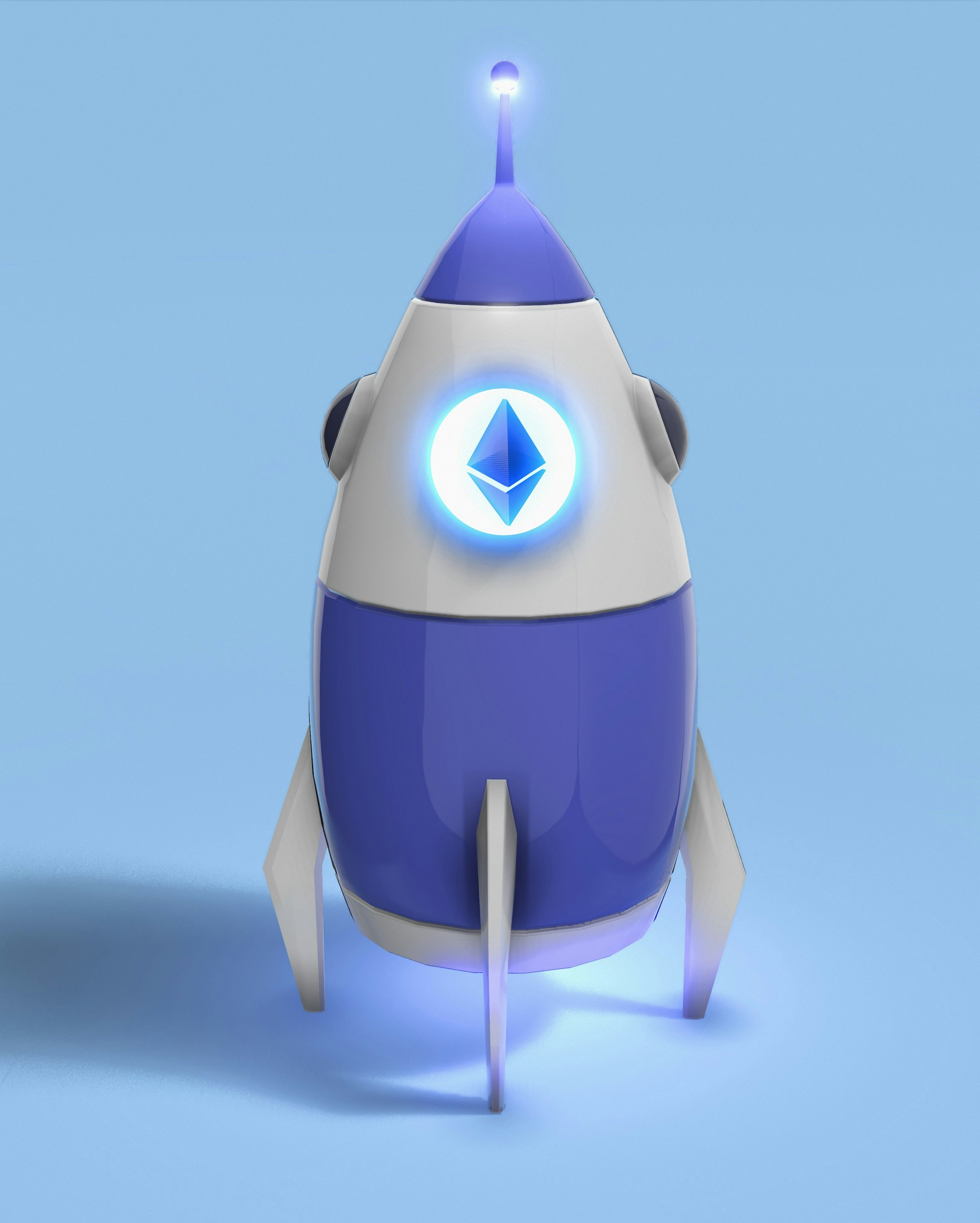 a blue and white robot with a light on its head